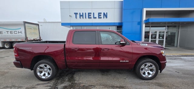 2022 RAM 1500 Big Horn in Red — front three-quarter view