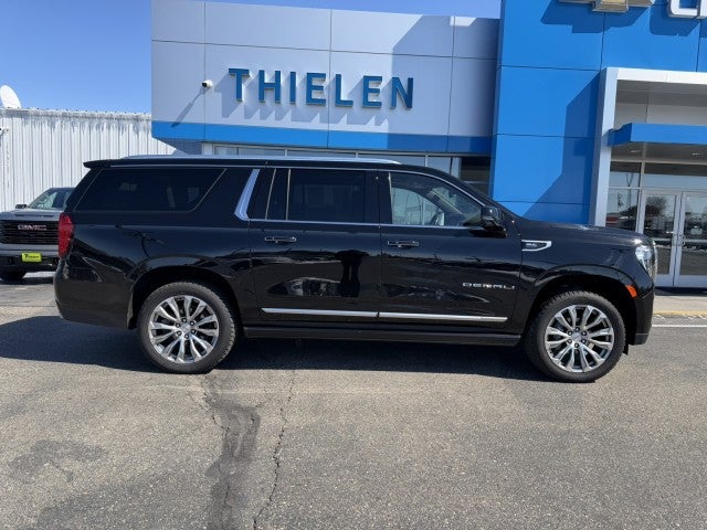 2021 GMC Yukon XL Denali in Onyx Black — front three-quarter view