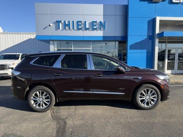 2022 Buick Enclave Avenir in Rich Garnet Metallic — front three-quarter view
